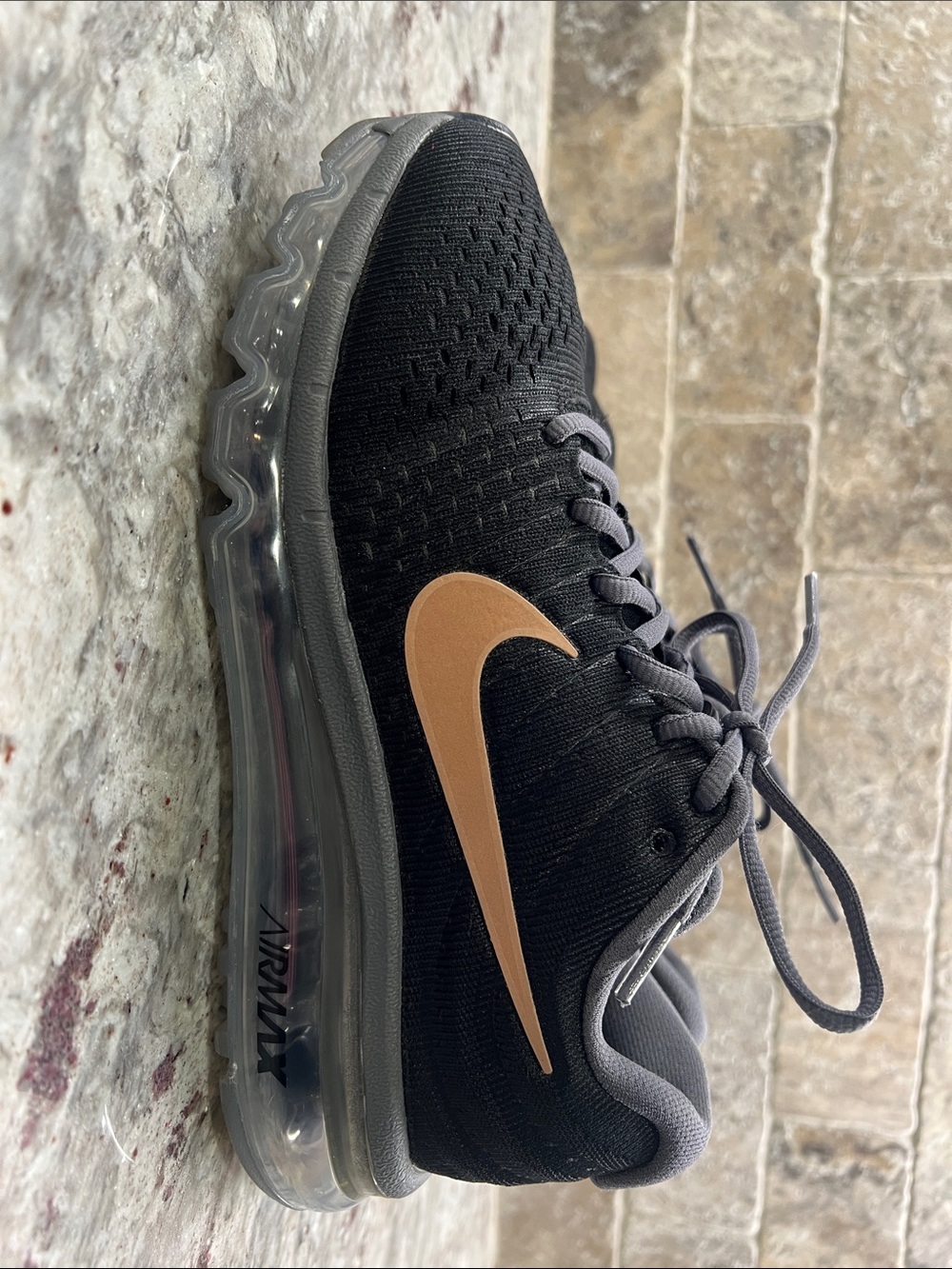 Ladies Nike Black Knit Athletic Shoe with Tan Swoosh